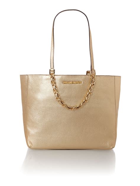 basket michael kors femme gold|Michael Kors gold purses.